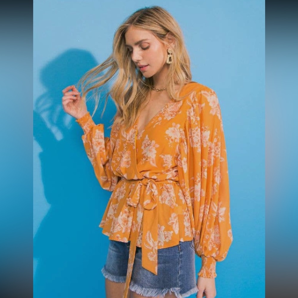 Peplum cinched cuff billowy sleeve cross front floral top mustard and cream
